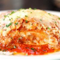Lasagna di FIGO* · Thin sheets of fresh egg pasta with meat ragu, bechamel sauce, mozzarella, and Parmigiano Re...