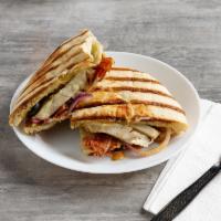 Grilled Chicken Club Panini · Grilled chicken breast, bacon, basil pesto, olives, red onions and pepper jack cheese