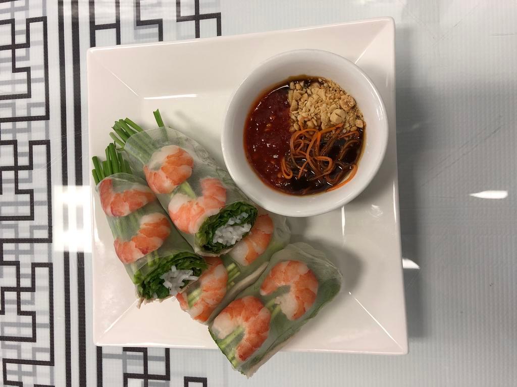 E02. Goi Cuon- 2 spring rolls · Spring roll with shrimp and pork, vermicelli noodle, and mint.