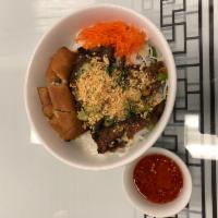 E15. Bun Cha Gio Thit Nuong · Grilled pork and imperial rolls serve with vermicelli. 