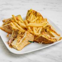 Club House Sandwich · Carne, pollo, tocineta, jamon, queso, huevo, lechuga, tomate, papitas. On soft bread, beef, ...