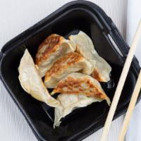 Dumplings · 6 pieces.