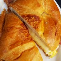 Grilled Croissant Sandwich · Scrambled eggs, cheese and choice of: bacon,turkey bacon, sausage, turkey sausage or avocado.