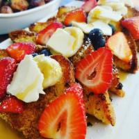 French Toast · Brioche French Toast topped with fresh berries.