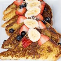 French Toast Combo · Brioche french toast, 2 eggs any style with choice of one: bacon, sausage, turkey sausage, t...