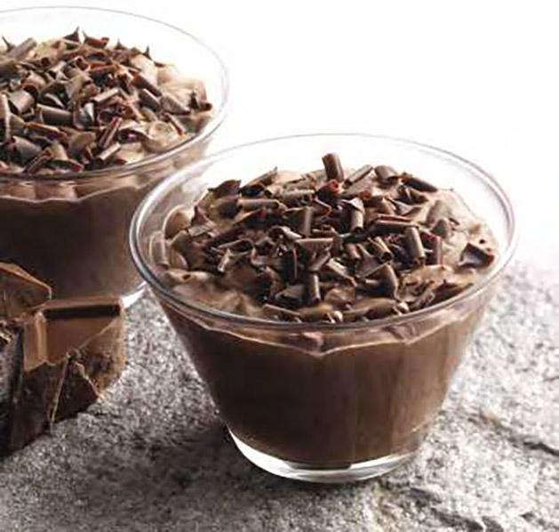 CHOCOLATE MOUSSE GLASS · Rich chocolate mousse with a heart
of zabaione, topped with chocolate curls.