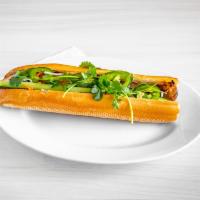 GRILLED CHICKEN BANH MI · GRILLED CHICKEN STUFFED IN A FRENCH BAGUETTE SERVED WITH VIETNAMESE HERBS AND PICKLED VEGGIE...