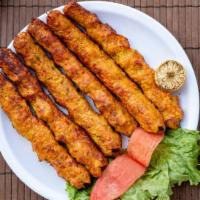 Chicken Seekh Kabab · Marinated ground beef cooked in a charcoal barbeque.