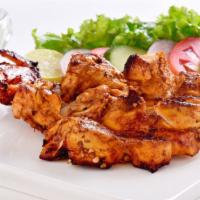 Chicken Breast Tikka Lahori · Marinated chicken breast cooked in a charcoal barbeque.