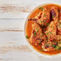 Chicken Ginger · Marinated chicken cooked with farmers market fresh ginger in a authentic spicy curry.