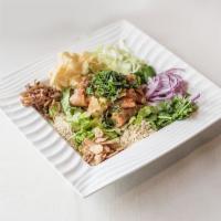 Samusas Salad · Vegetable samusas, lettuce, cabbage, sesame seed, onion, fried garlic, yellow pea powder and...