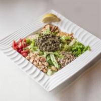 Tea Leaf Salad with Lettuce · Fermented tea leaf tossed with lettuce, peanut, fried garlic, tomato, fried yellow pea, jala...