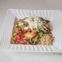 Burmese Style Pad Thai · Made with choice of protein, flat rice noodle, onion, bell peppers, lettuce, cabbage, egg an...