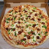 Extra Large BBQ Vegetarian Chicken Pizza · Sweet and tangy BB sauce, vegan chicken cubed, onions, green peppers, and our signature chee...