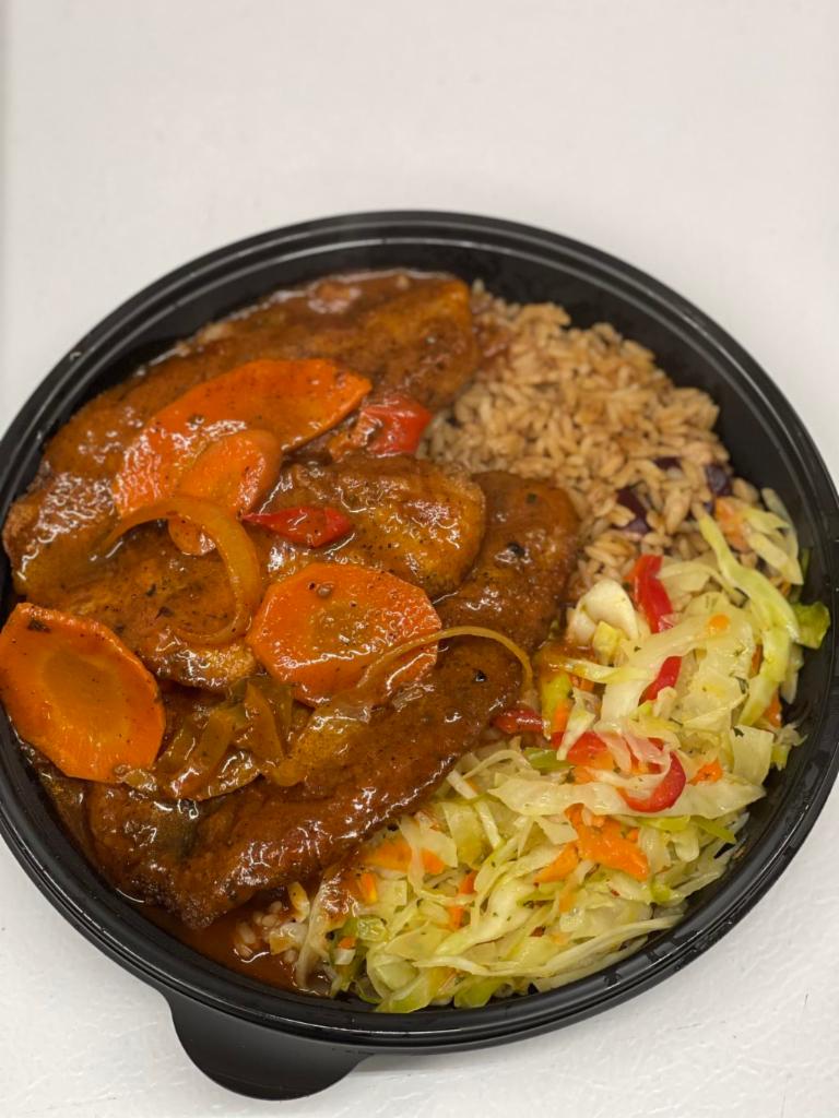 2 piece Island Fish Tilapia fillet · Two pieces of tilapia seasoned with a special blend of Caribbean herbs and spices, fried and served with a chunky tomatoes, onion and carrot gravy. Served with rice.