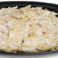 Chicken Alfredo · Rich and creamy Alfredo sauce served over penne pasta with rotisserie chicken and Parmesan c...