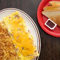 Ham Omelette · Ham and shredded cheddar cheese. Served with choice of breakfast potatoes and toast.