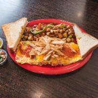 Santa Fe Omelette · Red and green bell peppers, onions, tomatoes, tortilla chips, shredded cheddar cheese, cover...