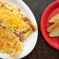 Pastrami Omelette · Chopped pastrami, cheddar cheese and eggs. Come with choice of breakfast potatoes and toast.