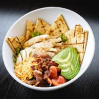 Chicken Cobb Salad · Grilled chicken breast with lettuce, sliced tomatoes and avocado, onions, bacon bits, and a ...