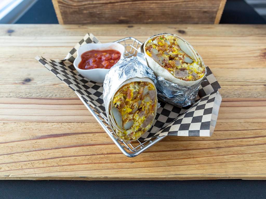 Breakfast Burrito · Sausage, daily's bacon, potatoes, scrambled eggs, and cheese wrapped in a tortilla, side of salsa.