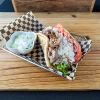 Idaho Beef Gyro Sandwich · Seasoned snare river farms beef slowly roasted, sliced thin with lettuce, tomato, onion, fet...