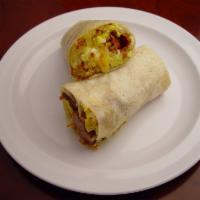 21. Breakfast Burrito · Your choice of meat and eggs. Served with cheese and hash browns.