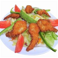 Shrimp Salad · Six delicious breaded shrimp on top of lettuce with cheese, tomato, bell peppers, avocado an...
