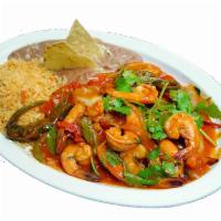 54. Camarones Rancheros · Twelve shrimp in ranchero sauce, bell peppers, cilantro, tomatoes, onions, tortillas, rice a...