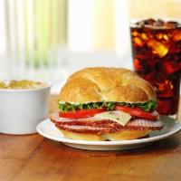 Ham Classic Sandwich Meal · Served with choice of side and a drink. Honey Baked Ham topped with Swiss cheese, lettuce, t...