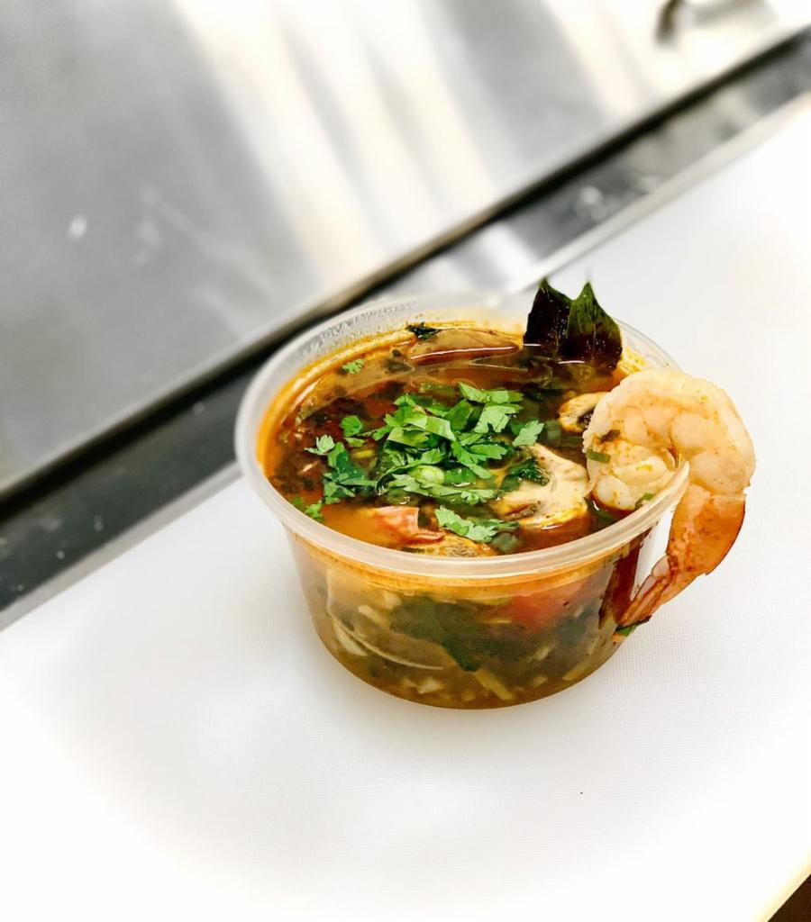Tom Yum Soup · Mildly spiced. Green onion, cilantro, tomato, mushroom, bamboo. Gluten-free. Dairy-free. Vegan.