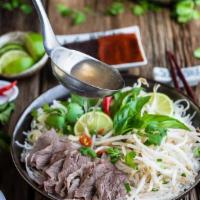 Pho Noodle · Sliced beef, rice noodles, green and red onion, cilantro, side of vegetable toppings - bean ...