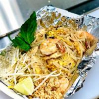 Pad Thai · Rice noodle, green onion, beansprout, egg. Topped with bean sprouts, fresh lime and crushed ...