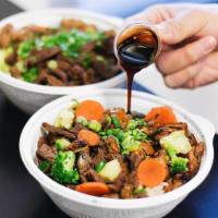 White Meat Chicken Mini Bowl · Flame Broiler sauce-basted white meat chicken served over your choice of base of brown or wh...