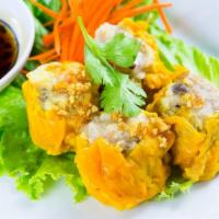 3. Thai Dumplings · 4 pieces. Dumpling stuffed with shrimp and pork served with soy vinaigrette sauce.
