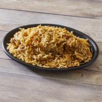 Chicken Biryani · Long-grained rice (basmati) flavored with exotic spices such as saffron is layered with chic...