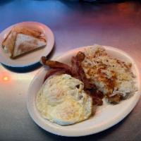 Bacon and Eggs · Bacon served w/2 eggs any style with choice of Hash browns and toast OR Pancakes.