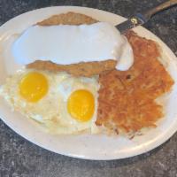 Country Fried Steak and Eggs · Country fried steak and 2 eggs, best in the Southwest and topped with country gravy.