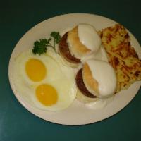 Southern Royalty · 2 eggs and 2 patty sausages sandwiched between 2 biscuits smothered with creamy gravy and se...