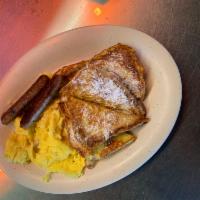 French Toast Special · 4 wedges of French toast with powdered sugar, 2 strips of bacon and 2 eggs.