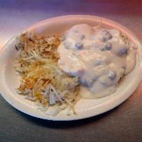 Biscuits and Sausage Gravy · 2 hot biscuits smothered in creamy sausage gravy and served with hash browns.