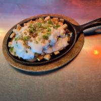 Country Fried Steak Skillet · Country fried steak served with 2 eggs, onions, bell peppers, white gravy and country potato...