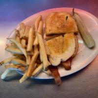 Fire Chicken Melt · Chicken breast in grilled sourdough bread with pepper jack cheese, Pueblo chilies, tomatoes ...