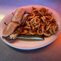 Pueblo Italian Sausage Sandwich · Spicy Italian sausage with Pueblo chilies and melted pepper jack cheese on a grilled hoagie ...