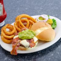 Southwest Burger · A big time beef patty with Swiss and American cheese topped with 2 bacon strips and guacamole.