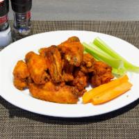 Victory Chicken Wings · Served with your choice of sauce.