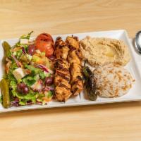 Chicken Kebab Plate · Marinated and grilled chicken breast cubes.