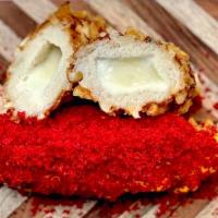 Flamin' Cheetato  · Inside: All mozzarella cheese. 
Outside: Fries, nacho cheese & hot cheeto dust.