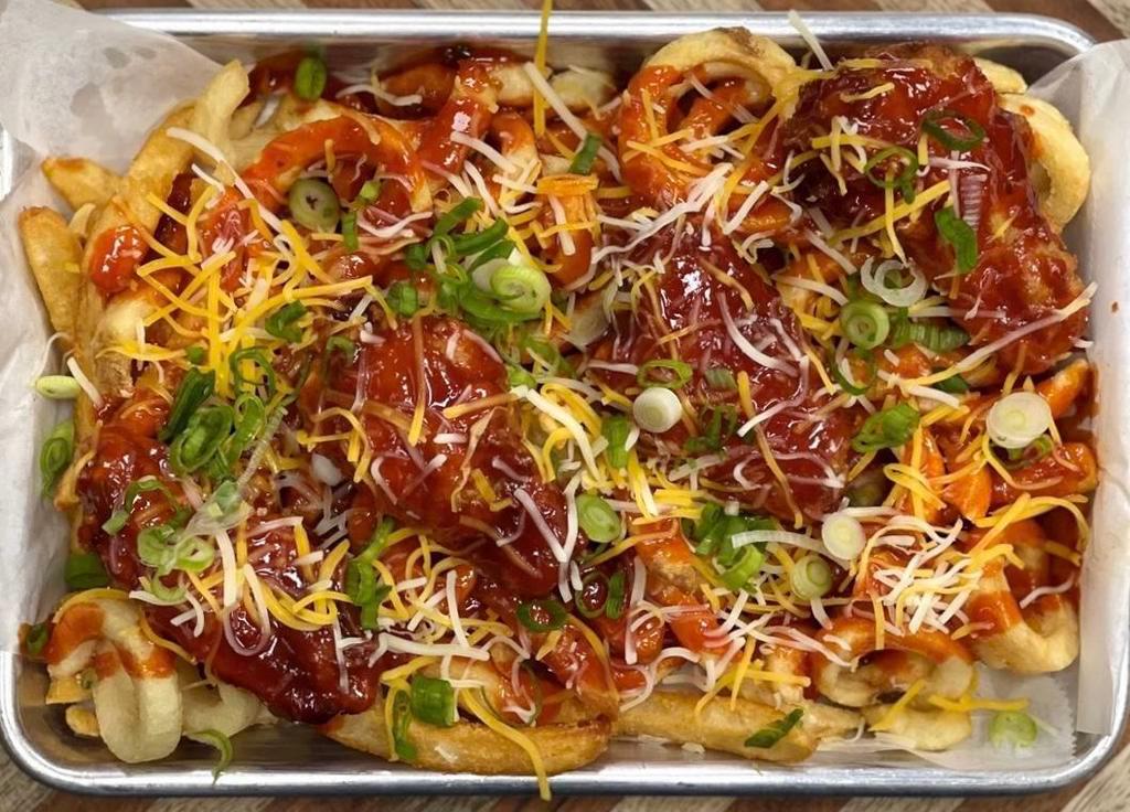 K-Style Chicken Fries  · Fries with crispy chicken wings drizzled with our house-made Korean sweet & spicy glaze. All topped with shredded cheese & green onions. 