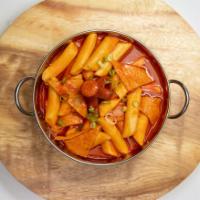 Spicy Rice Cakes Tteokbokki · Korean rice cakes and fish cakes cooked in our special sweet and spicy house-made sauce. Top...